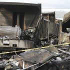 fire_at_philscotts_biz_toby_010912_ap12010915063.jpg